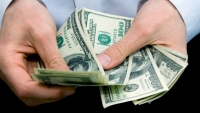 El d&oacute;lar marc&oacute; el r&eacute;cord de $65 y la bolsa porte&ntilde;a avanz&oacute; 3,12%